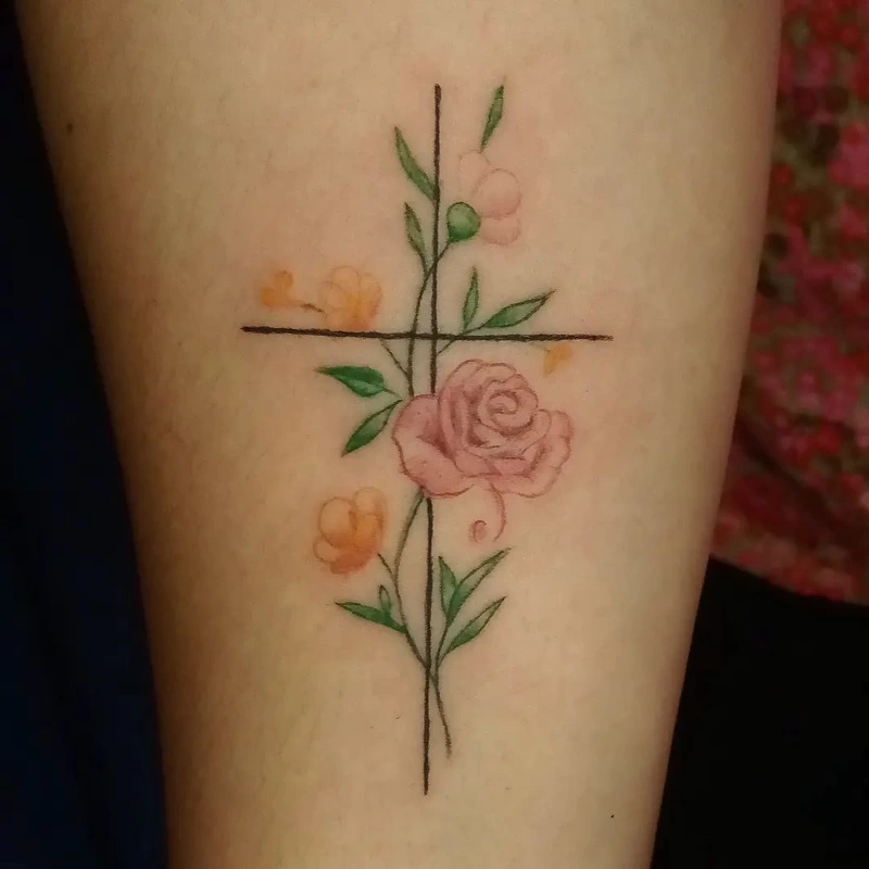 Floral cross tattoo done by Brian Haggerty at Overlord Tattoo Studio, Palm Coast, Flagler Beach FL. 