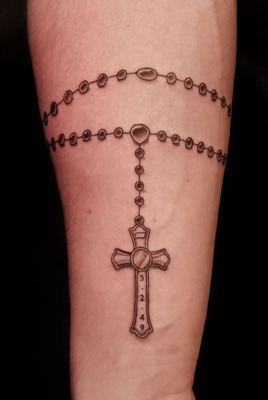 Rosary tattoo done by Brian Haggerty at Overlord Tattoo Studio, Palm Coast, Flagler Beach FL. 